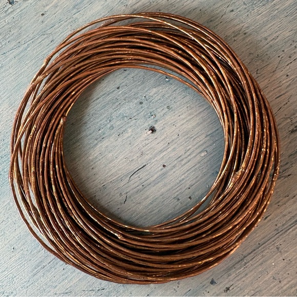 Gold-Tone 43 Interlocking Bangle Bracelets - Picture 6 of 9